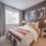 bedroom bed next to nightstand Rivermark Northern Liberties Philadelphia PA luxury apartments 
