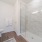 bathroom toilet and glass enclosed shower Rivermark Northern Liberties Philadelphia PA luxury apartments 