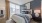 bedroom bed next to nightstand Rivermark Northern Liberties Philadelphia PA luxury apartments 