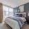 bedroom bed next to nightstand Rivermark Northern Liberties Philadelphia PA luxury apartments 