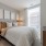bedroom bed next to nightstand Rivermark Northern Liberties Philadelphia PA luxury apartments 