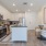 kitchen appliances and island next to dining table and chairs  Rivermark Northern Liberties Philadelphia PA luxury apartments 