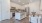kitchen appliances and island next to dining table and chairs  Rivermark Northern Liberties Philadelphia PA luxury apartments 
