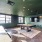 Resident clubroom with TV, games inside waterfront apartment