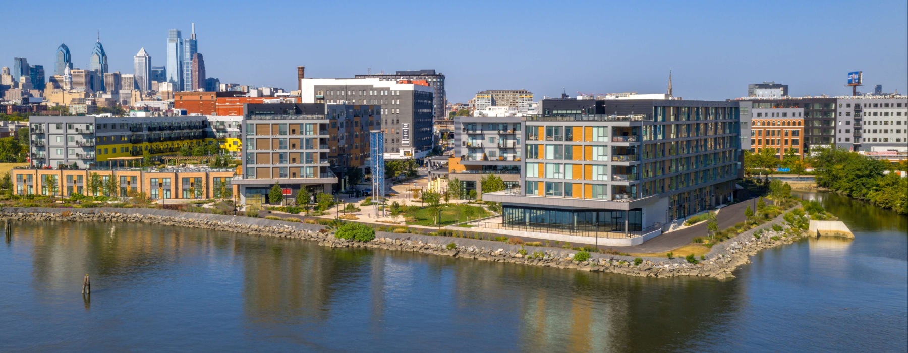 aerial view of Rivermark Northern Liberties 2 apartment buildings set on the waterfront - best Philly luxury apartments on the waterfront 