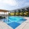 pool with lounge chairs next to building  Rivermark Northern Liberties waterfront apartments Philadelphia PA