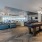 resident game room seating with tv, fireplace, shuffleboard,  billiards , games, fireplace and tv Rivermark Northern Liberties luxury apartments Philadelphia PA 