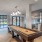 resident game room seating with shuffleboard and  games  Rivermark Northern Liberties luxury apartments Philadelphia PA 