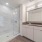 glass-enclosed shower and double vanity bathroom  Rivermark Northern Liberties Philadelphia PA luxury apartments for rent