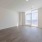 living room vacant space with sleek plank flooring  Rivermark Northern Liberties Philadelphia PA luxury apartments for rent