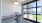 co working table and chair with view of water Rivermark Northern Liberties Philadelphia PA luxury apartments for rent
