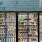 an aisle of refrigerators containing dairy products at local Sprouts