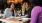 women sitting at a table with wine glasses Rivermark apts Philadelphia PA Northern Liberties  